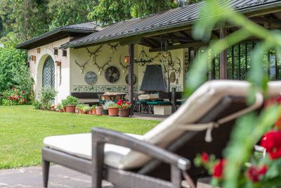 Relax in the garden of the Hotel Salzburg Haus Arenberg!
