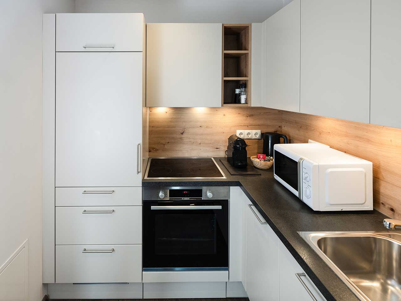 Küche in einer Suite im Hotel Haus Arenberg Salzburg